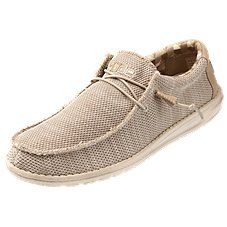 Let your feet breathe a sigh of relief in the Hey Dude\u00ae Wally Sox Classic Shoes for Men. These ultra-breathable shoes feature a textured knit construction that stretches for cool, easy-goin' comfort. The incredibly lightweight boat shoes feature removable memory-foam insoles that cushion your feet and fight odors, while Flex &ampamp; Fold outsoles support your feet while allowing the flexibility to move freely. Elastic laces provide a secure fit without pinching or chafing. The Hey Dude Mens Beach Attire, Classic Shoes For Men, Mens Beach Shoes, Sigh Of Relief, Beach Wedding Shoes, Hey Dudes, Hey Dude, Breathable Shoes, Elastic Laces