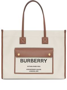 cream/brown calf leather/cotton contrasting trim front flap pocket two rounded top handles main compartment internal zip pocket Canvas Leather Tote, Simple Wardrobe, Contrasting Trim, Burberry Belt, Burberry London, Natural Tan, Cream Beige, Burberry Women, Canvas Leather