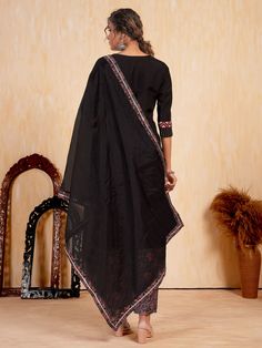 Introducing our stunning "awesome black embroidered silk traditional pantsuit with dupatta", a perfect addition to your ethnic wardrobe. Crafted from high-quality silk material, this suit features intricate embroidery and handwork that adds a touch of elegance and sophistication. The set includes a black color suit with embroidered details, matching silk pants, and a dupatta with printed work, giving you a complete traditional look.
This pantsuit includes fully stitched black suit pants, availab Black Chanderi Churidar With Embroidered Border, Chanderi Churidar With Embroidered Border In Black, Black Chanderi Kurta With Embroidered Border, Black Sharara With Intricate Embroidery For Navratri, Black Dupatta With Intricate Embroidery For Navratri, Black Straight Kurta For Traditional Ceremonies, Black Chanderi Sharara With Resham Embroidery, Black Kurta For Navratri Traditional Ceremonies, Black Anarkali Set With Straight Kurta