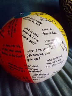 a large white and red ball with writing on it