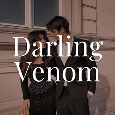 a man and woman standing next to each other in front of a building with the words daring venom