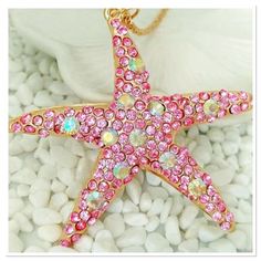 Beautiful Pink And Clear Rhinestone Encrusted Pendant On A 26” Gold Rope Chain. Pendant Measures 3” X 3”. New Pink Starfish Jewelry For Gift, Pink Starfish Charm Jewelry, Pink Rhinestone Necklace With Bling For Gift, Pink Rhinestone Bling Necklace For Gift, Pink Rhinestone Bling Necklace Gift, Pink Crystal Rhinestone Necklace With Sparkling Stones, Pink Star Jewelry With Starfish Charm, Pink Star-shaped Jewelry With Starfish Charm, Pink Star-shaped Jewelry For Party