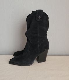 Vintage black suede mid calf cowgirl boots with chunky heels for women.  Side half zippers, buckles on bootleg top. Subtle cowgirl/cowboy style. Fabric lining. Brand: Steve Madden (Made in Indonesia) Condition: used condition, great, without damages.  Sizes:  EU 37 (labeled), US 6.5 measurements: outsole length 26 cm / 10.1" in heels height 9 cm/ 3.5" in boots total height with heels 26 cm / 10.1" in bottom sole width in widest place 9 cm / 3.5" in Western Mid-calf Boots With Wide Calf And Block Heel, Western Style Wide Calf Mid-calf Boots With Block Heel, Western Suede Heeled Boots For Winter, Western Block Heel Boots For Winter, Western Style Suede Heeled Boots For Winter, Western Style Wide Calf High Heel Mid-calf Boots, Western Style Block Heel Heeled Boots For Winter, Mid-calf Boots For Rodeo, Western Style High Heel Mid-calf Boots For Winter