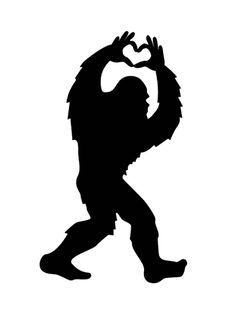 a black and white silhouette of a bigfoot holding his hands in the shape of a heart