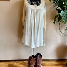 Darling Ivory Dress Perfect For Spring & Summer Bohemian Cream Mini Dress For Fall, Flowy Cream Tunic Dress, Flowy Beige Boho Dress For Brunch, Spring Beige Boho Tunic Dress, White Tunic Dress For Fall, White Tunic Fall Dresses, Chic White Flowy Tunic, Beige Tunic Dress For Brunch, Chic White Loose Fit Tunic