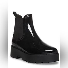 Brand New. Smoke Free Pet Free Modern Black Synthetic Boots, Trendy Black Boots With Flat Heel, Trendy Black Flat Heel Boots, Casual Black Platform Boots, Trendy Black Closed Toe Boots, Black Slip-on Boots With Lug Sole, Trendy Black Waterproof Boots, Black Slip-on Spring Boots, Black Slip-on Boots For Spring