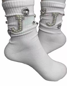 Elevate your sock game with these stunning women's socks. The J initial pearl and white rhinestone design is perfect for adding a touch of elegance to any outfit. Made with high-quality materials and handcrafted with care, these crew socks are both comfortable and stylish. The mid-calf length and size 6-10 fit make them a versatile option for any woman's wardrobe. Whether you're dressing up for a special occasion or just want to add some sparkle to your everyday look, these socks are the perfect choice. L Initial, J Initial, Mens Bling, Sock Game, Women's Socks, White Rhinestone, Rhinestone Designs, Womens Casual, Casual Socks