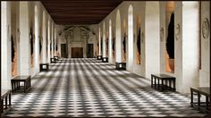 an empty hallway with checkered flooring and benches lined up against the wall in front of it