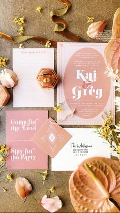 the wedding stationery was done in pink and gold