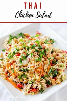 thai chicken salad on a white plate with the words thai chicken salad in front of it