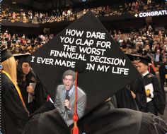 a graduation cap with the words how dare you clap for the worst financial decision i ever made in my life