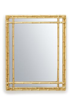 a mirror that is made out of wood and has a bamboo frame on the front