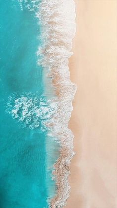 an aerial view of the beach and ocean