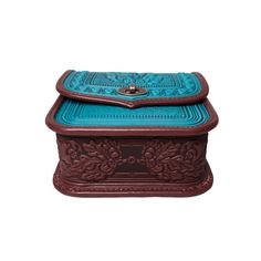 Introducing our Turquoise and Bordo Crossbody Purse, a stylish leather shoulder bag designed for women who appreciate both fashion and functionality. This purse features one main section and a small pocket for your mobile phone, along with a button to securely fix your keys, ensuring easy organization and quick access to your belongings. The adjustable shoulder strap offers a length range of 47.2 to 31.5 inches (120 to 80 cm), providing comfort whether worn as a shoulder bag or a backpack. Addit Turquoise Leather Shoulder Bag For Travel, Turquoise Crossbody Shoulder Bag With Removable Pouch, Turquoise Leather Shoulder Bag, Blue Rectangular Case Shoulder Bag For Gift, Turquoise Rectangular Shoulder Bag With Removable Pouch, Turquoise Pouch Shoulder Bag For Travel, Turquoise Rectangular Shoulder Bag, Blue Leather Phone Bag, Classic Office