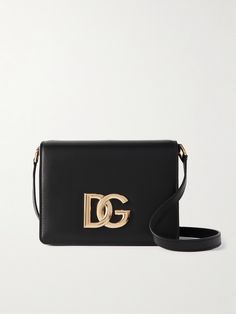 Dolce&Gabbana's bag is part of the '3.5' collection - each style is embellished with a gold-tone 'DG' logo. Defined by a small but structured shape, it's been made in Italy from smooth leather and has an adjustable strap, so you can wear it cross-body. Inside, you'll find an organized interior with slots for your cards and enough space for your phone, lipstick and mints. Dg Logo, Structured Bag, Gold Bag, Black Shoulder Bag, Black Bag, Pink Bag, Smooth Leather, Leather Shoulder Bag, Cross Body