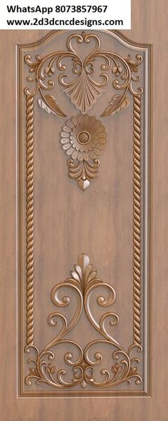 an ornate wooden door with decorative designs on it