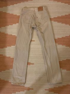 Awesome rare vintage beige Levis jeans from the 90s. Made in the US. Button fly. Slim/straight leg fit. Size: Listed as W29/L34 but measure closer to W28/L33. Condition: Preowned but in great condition. Some slight fading in spots but hardly noticeable (see photos).  Material: 100% cotton.  Color: Beige/tan/khaki/cream. Vintage Straight Leg Beige Jeans, Vintage Beige Straight Leg Jeans, Levis Beige Jeans, Levi's Vintage Cotton Jeans, Vintage Levi Pants, Levi 501s, Levis Jeans, Straight Leg, Adult Outfits