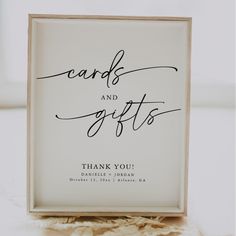 a sign that says cards and gifts with the words thank you in black on it