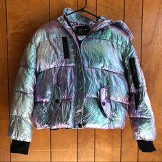 Brand New Without Tag Nwot Fashion Nova Ultra Rare Hard To Find Gorgeous Hologram Iridescent Bling Puffer Jacket Coat Size Large / L Super Pretty In The Light/Sun Perfect For Concerts, Fair, Festival, Rave, Etc Price Is Going To Be Pretty Firm On This Super Cool On! A Must Have Item. A Gorgeous Jacket From Fashion Nova In Size Large. Love The Iridescent Fabric. It's So Warm! Lots Of Pockets. Very Unique. No Flaws. Very Unique And Fun Jacket! Tags: Holographic Holo Dolls Kill Lisa Frank Hot Topic Trendy Iridescent Outerwear For Fall, Iridescent Long Sleeve Outerwear For Spring, Trendy Iridescent Long Sleeve Outerwear, Spring Iridescent Long Sleeve Outerwear, Fair Festival, Fun Jacket, Iridescent Fabric, Rare Fashion, Light Sun