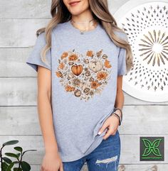 Fall Heart Women Shirt, Fall Pumpkin T-Shirt,Autumn Leaves and Pumpkins Tee,Fall Lover Floral Gift,Family Thanksgiving Shirt,Love Fall Y'All HOW TO ORDER 1. From the two Drop-down menus select the Size and the Shirt Color you need. 2. Add these to your cart. *You will need to return to the listing to add the other sizes and designs you need before checking out. 3. After adding all the shirts to the Cart, Checkout them together. DELIVERY & RETURN Order Processing time for Dispatch: 1 working days Family Matching Short Sleeve Tops For Fall, Cute Heart Graphic Tops For Fall, Cute Fall Tops With Heart Graphic, Fall Family Matching Crew Neck Tops, Fall Cotton T-shirt With Floral Print, Cotton Heart Graphic T-shirt For Fall, Fall Long Sleeve Heart Graphic T-shirt, Cotton T-shirt With Heart Graphic For Fall, Fall Cotton T-shirt With Heart Graphic