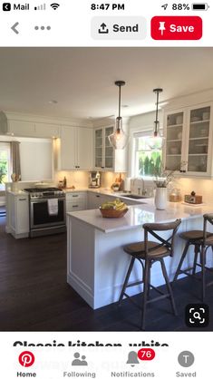 a kitchen with two stools and an island in front of the stove top oven