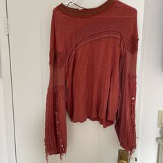 Free People Sweater With Fringe And Embroidery, Size M Never Worn Bohemian Embroidered Long Sleeve Tops, Bohemian Long Sleeve Embroidered Tops, Long Sleeve Tops With Floral Embroidery For Fall, Red Crew Neck Blouse For Fall, Long Sleeve Floral Embroidered Tops For Fall, Fall Embroidered Sleeve Fitted Tops, Embroidered Long Sleeve Tops For Fall, Winter Long Sleeve Tops With Floral Embroidery, Winter Floral Embroidery Long Sleeve Tops