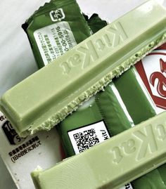 three bars of green chocolate sitting on top of each other