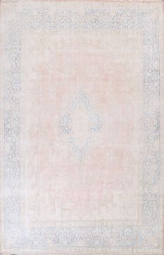 an antique rug with blue and pink colors on the border is shown in this image