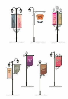 a series of street lamps with different signs on them