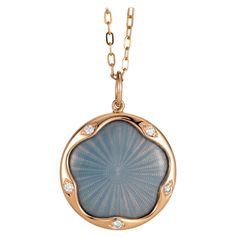 Victor Mayer round pendant necklace 18k rose gold, Macaron Collection, translucent opalescent turquoise vitreous enamel, guilloche, 5 diamonds total 0.07 ct, G VS, brilliant cut, diameter app. 19.0 mm About the creator Victor Mayer Victor Mayer is internationally renowned for elegant timeless designs and unrivalled expertise in historic craftsmanship. Lovers of the extraordinary appreciate the beauty of Victor Mayer's designs, which use extremely rare techniques such as genuine enamel or elaborate engravings. Since 1890, the company has stood for the finest jewellery Hand Made in Germany. It is an open secret that the most renowned brands, such as Fabergé, entrust the company with the production of their most exquisite collections. Reference: V1705/OT/00/00/103_V1376/00/00/00/10345 Brand: Gold Macaron, Drop Necklaces, Guilloche Enamel, Modern Jewellery, Pearl Drop Necklace, Vitreous Enamel, Round Pendant Necklace, Jewelry Website, Enamel Necklaces