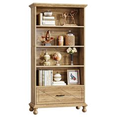 a wooden bookcase with drawers and pictures on it