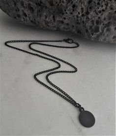 "Black coin women's necklace, black chain disk pendant, matte black necklace, rocker pendant, grunge style necklace, minimal black necklace Welcome to my shop! ✈️ DHL EXPRESS SHIPPING AVAILABLE, 1-3 BUSINESS DAYS DELIVERY! ✔️ PLEASE MAKE SURE TO SELECT IT, RIGHT BEFORE YOUR PURCHASE! ❗️ ❗️ DON'T FORGET TO ADD YOUR CELL # AT THE \"NOTE TO SELLER\" SECTION IF YOU CHOOSE DHL! BY FILLING YOUR CELL NUMBER YOU EARN THE BENEFIT TO CHOOSE BETWEEN 6 DIFFERENT DELIVERY OPTIONS! INSTRUCTIONS WILL BE SENT T Disc Pendant, Grunge Style, Black Chain, Black Necklace, Coin, Grunge Fashion, Layered Necklaces, Matte Black, Rocker