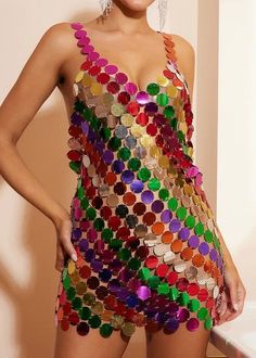 This Multicolor Rainbow Metallic Chainmail Dress is perfect for any party or festival with its stunning halter design and adjustable size that fits S-XL. Its mini length adds a touch of glamour while the chainmail fabric gives off a unique and eye-catching metallic rainbow effect. The perfect statement piece for a night out. Summer Chainmail Dress, Carnival Party Mini Dress, Disco Mini Dress For Party Season Festivals, Summer Party Chainmail Dress, Sleeveless Chainmail Party Dress, Sleeveless Chainmail Dress For Party, Multicolor Sequin Disco Mini Dress, Multicolor Sequined Disco Mini Dress, Multicolor Disco Mini Dress For Evening