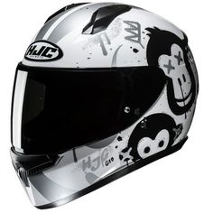 the helmet is decorated with skulls and crossbones on it's side,