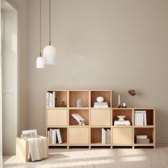 a living room filled with furniture and a book shelf