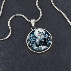 Embrace the cleverness and adaptability of the fox, a spirit animal that symbolizes wisdom, agility, and a keen awareness of surroundings. This design captures the fox's elegant form, poised gracefully under a glowing full moon and surrounded by swirling patterns and celestial elements. The intricate details reflect the fox's traits of intelligence, cunning, and the ability to navigate through life's twists and turns with grace and ease. Let this piece inspire you to trust your instincts, embrac Enchanted Night, Celestial Elements, Fox Jewelry, Foxes Necklace, Fox Pendant, Solid Gold Necklace, Circle Pendant Necklace, Luxury Necklace, Glass Style