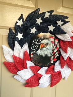 a patriotic wreath with an eagle and stars on it