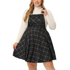 This trendy dress is a must-have for teens seeking a unique style and is a fit for plus-size ladies. The overall dress petite is a versatile piece that can be dressed up or down. This plaid dress for women features a classic pattern that never goes out of style. The plaid skirt overalls for women add a playful, youthful vibe to your wardrobe. Wear this plaid overall dress for women on a casual day out or for a semi-formal event. The plaid winter dress is a great addition to your cold-weather war Plaid Overall Dress, Plaid Overalls, Plaid Dress Vintage, Red Black Dress, Swing Design, Plus Size Elegant, Overall Skirt, Mid Skirt, Pinafore Dress