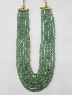 Add a touch of universal elegance with this Six-Layered Emerald Pumpkin Beads Necklace, perfect for both men and women, including groom jewelry. This versatile piece showcases rich, faceted emerald beads in a bold, multi-strand design that radiates sophistication. Ideal for anyone aiming to make a statement, it lends a luxurious and regal touch to any ensemble, suitable for weddings, formal events, or significant occasions. Material : Natural pumpkin shaped Russian quartz with adjustable silk th Groom Jewelry, Pumpkin Beads, Pumpkin Bead, Emerald Bead, Tourmaline Necklace, Emerald Necklace, Pin Pendant, Pendant Rings, Natural Emerald