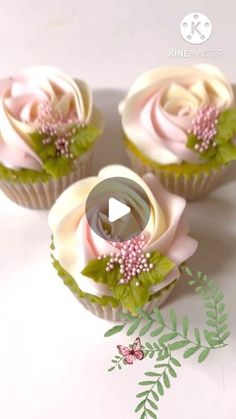 three cupcakes decorated with pink and green flowers