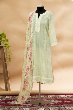 Green straight kurta with placement floral motif work, ladder trims and tassel tie-up. Comes with printed scallop dupatta.
Components: 2

Neckline: Round
Sleeve Length: Long
Color: Green
Printed, Embroidered
Split neck
Tassel tie-up
Scallop border dupatta
Side slits
Lace trims - Aza Fashions Spring Pista Green Kurta With Dupatta, Unstitched Pista Green Kurta For Spring, Bohemian Georgette Dupatta For Spring, Spring Bohemian Georgette Dupatta, Fitted Salwar Kameez With Embroidered Border For Spring, Anarkali Style Summer Dupatta With Embroidered Border, Pista Green Designer Lawn Suit For Spring, Festive Unstitched Pista Green Suit For Spring, Pista Green Lawn Suit For Spring Designer Wear