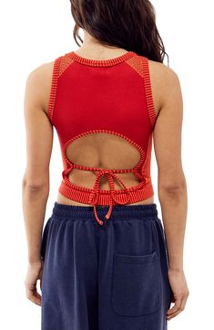 This cool cropped tank is crafted in a close-fitting silhouette with a tied-and-cutout back. 15" length (size Medium) Ties at back Crewneck Sleeveless 38% polyester, 35% recycled polyamide, 21% polyamide, 6% elastane Machine wash, line dry Made in Turkey Fitted Crop Top With Cutout Back For Spring, Fitted Crop Top With Cutout Back For Summer, Red Tank Crop Top For Spring, Fitted Crop Top With Tie Back And Tank Straps, Red Cropped Tank Top For Spring, Sporty Red Crop Top For Spring, Cropped Tops With Cutout Back, Red Sporty Crop Top For Spring, Stretch Crop Top Tank Top With Tie Back