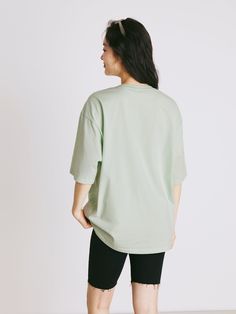 Details: Refreshing bean green T-shirt Loose oversize version The bread pattern on the chest ins style, new and cute Classic round neck design with ribbed trim Materials & Care: Cotton 100% Hand wash | Dry clean Do not bleach Size & Fit: Model is 5'7", Bust 32, Waist 24, Hips 35, wearing a size S Item #: LM2TE34 Green Drop Shoulder Tops For Streetwear, Green Drop Shoulder Cotton T-shirt, Green Relaxed Fit Top With Ribbed Neckline, Green Cotton Drop Shoulder Tops, Green Top With Ribbed Neckline And Relaxed Fit, Comfortable Oversized Top With Ribbed Neckline, Green Oversized Graphic Tee, Green Oversized Short Sleeve Tops, Oversized Green Short Sleeve Top