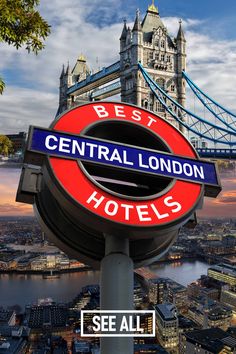 the sign for central london hotels is in front of the tower bridge and river thames