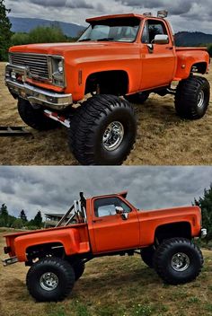 an orange pickup truck parked on top of a grass covered field