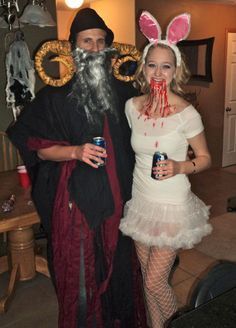 a man and woman dressed up in costumes