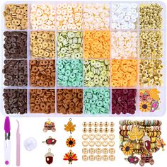 various beads and accessories are arranged in an organized tray with scissors, bead hooks, and other items