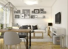 a living room filled with furniture next to a wooden table and white walls in front of a flat screen tv mounted on the wall