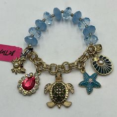 Betsey Johnson Nautical Sea Charm Half Stretch Bracelet Fits Size 6.5" - 7" Wrist - 5 Large Charms 5 Pearls/Diamond Charms Gold Metal Hardware - Iconic Betsey Johnson Logo Dangle Charm - Stretch - 30+ Rhinestones 10 Faceted Blue Beads Retail 125 Betsey Johnson Jewelry, Diamond Charm, Sea Ocean, Sea And Ocean, Pearl Diamond, Dangle Charms, Blue Bracelet, Garment Bags, Blue Beads