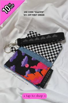 the key chain is attached to an item that looks like it has been made out of fabric